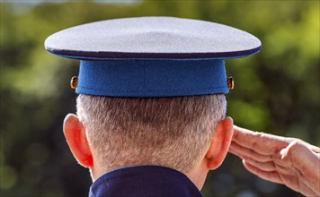 Russian officer salutes at the Soviet memorial on Straße des 17. Juni to commemorate the Soviet