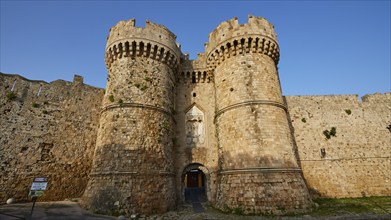 A stone castle wall with shadows in the sun, sea gate, harbour area, Rhodes Town, Rhodes,