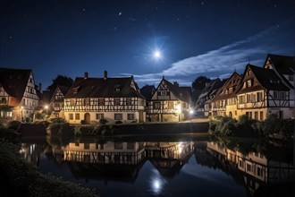 Traditional half timbered house nestled within the heart of a picturesque village at night, AI