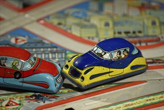 Road traffic, automobile, collision at crossroads, shown with model cars made of sheet metal