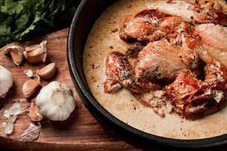 Shkmeruli, fried chicken, in milk-garlic sauce, Georgian cuisine, homemade, close-up, no people