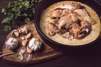 Shkmeruli, fried chicken, in milk-garlic sauce, Georgian cuisine, homemade, close-up, no people