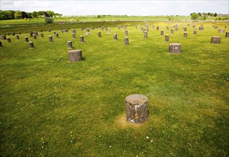 Concrete marker posts identify the position of wooden posts at Neolithic Woodhenge site at