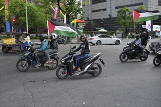 Motorcyclists with Palestine flags