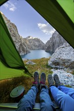 Wild camping, camping in the wilderness with a tent, Kol Suu mountain lake, Sary Beles Mountains,