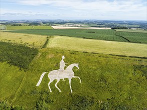 Fields and farms over Osmington White Horse from a drone, Osmington Hill, Weymouth, Dorset,