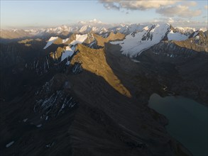 Evening mood, mountain panorama, aerial view, 4000 metre peak with glacier, mountain pass and