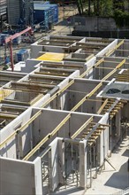 Building site, shell construction, walls of a residential building are finished, lift shaft