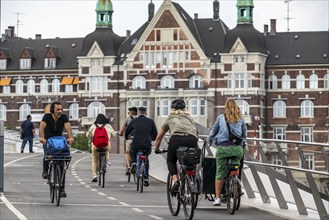 Cyclists on the Lille Langebro cycle and pedestrian bridge over the harbour, Copenhagen is