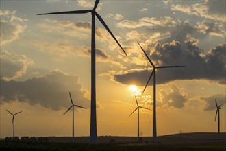 Wind farm, wind turbine, wind turbines, in front of sunset, storm clouds, Swabian Alb,