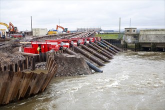 Engineering work on flood defences on the King's Sedgemoor Drain river at Dunball, near Bridgwater,