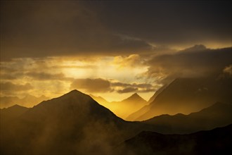 Montafon mountains with dramatic cloudy sky at sunset, Tschagguns, Rätikon, Montafon, Vorarlberg,