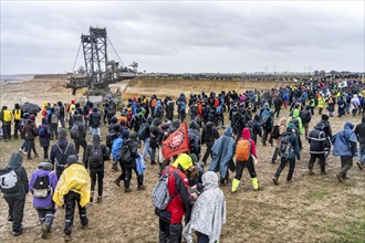 Many thousands of demonstrators march after a demonstration against the demolition of the lignite