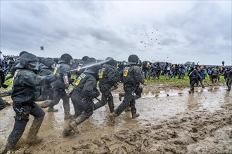 Violent clashes between thousands of demonstrators and the police, after a demonstration against