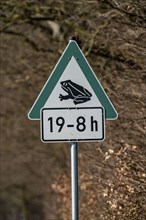 Information on toad migration, amphibians, but only from 7-8 pm, sign, on a country road near