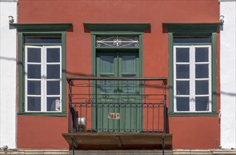 House facade with balcony, Symi Island, Dodecanese, Greek Islands, Greece, Europe