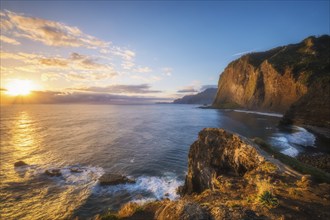 View of Madeira scenic cliffs coastline landscape on sunrise, Guindaste viewpoint, Madeira island,