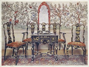 Furniture around the turn of the century 1900, Sofa, chairs and table in black lacquer, mirror in