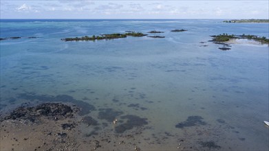 Bird's eye view of aerial view of lagoon and small islands at Cap Malheureux, Mauritius, Africa