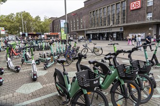 Designated sharing stations, parking space for e-scooters, rental bikes, e-scooters, in front of