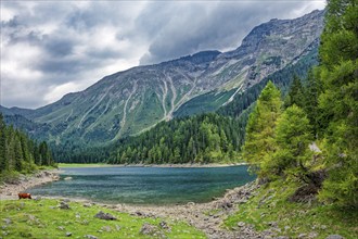 Obernberger See, mountain lake, landscape of the Stubai Alps, weather mood, cloud mood, Obernberg