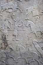 Detail of battle scene on the rear of the Aberlemno Kirkyard Cross Slab, a Pictish stone in