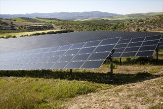 Array of photovoltaic solar panels in Mediterranean sunshine, near Alhama de Granada, Spain, Europe