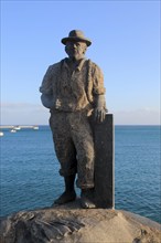 'Pescador de Viejas' sculpture by Juan Miguel Cubas Sanchez, 2003, Puerto del Rosario,