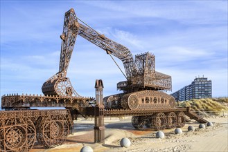 Caterpillar + Flatbed Trailer, artwork by Belgian neo-conceptual artist Wim Delvoye at seaside