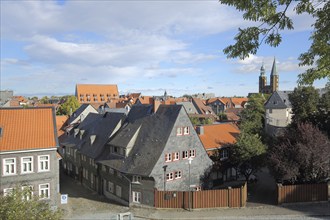 View of houses with slate roof and market church, Goslar, Harz, Lower Saxony, Germany, Europe