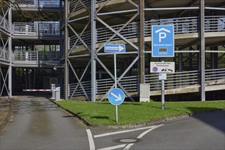 Traffic sign for the multi-storey car park and one-way street sign in Nordsternpark, Gelsenkirchen,