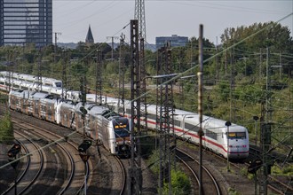 Tracks in front of Essen main station, ICE 2 train and ICE 4, at the back of the tracks, RRX