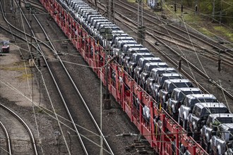 Freight train, car train with Landrover new cars on the goods train line at the Hagen-Vorhalle