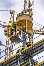 Concreting work on a construction site, new construction of a high-rise office building, facade of