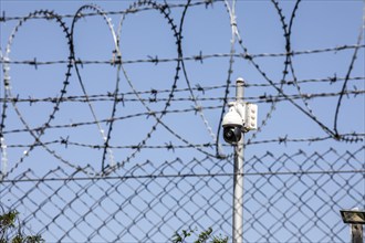 Video surveillance on a barbed wire fence