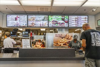 Customer ordering fast food in a Burger King restaurant