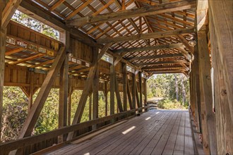 Exposed wood framing of a covered bridge outside of Elberta, Alabama, USA, North America