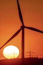 Emschergenossenschaft wind turbine, view to the west, in Essen, sunset, North Rhine-Westphalia,