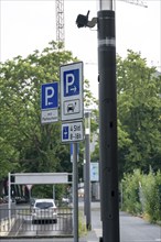 E-charging station in new smart poles, intelligent street lamps, test run, EON and the city of