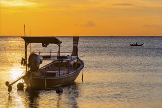 Longtail boat in the sunset, boat, sun, evening mood, cloudy sky, colourful, orange, wooden boat,