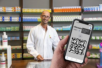 Symbolic image of an e-prescription, prescription issued by a doctor, with QR code, is scanned