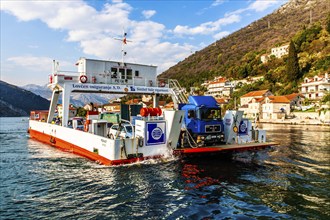 Approach to Kotor by ferry, medieval town of Kotor with winding alleyways, rich in historical