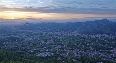 View of the densely populated Neapolitan region and the mountains near Caserta at dusk. San Felice