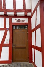 Entrance to the town hall, in the four-gabled house, Monreal, idyllic half-timbered town in the Elz