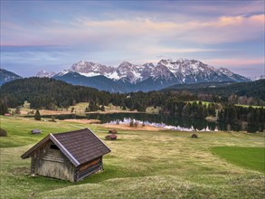 Huts at Geroldsee or Wagenbrüchsee, sunset, Krün near Mittenwald, Karwendel, Werdenfelser Land,