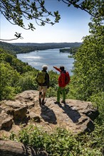 Hiking on the Baldeney Steig, a hiking trail around Lake Baldeney in Essen, a Ruhr reservoir, over