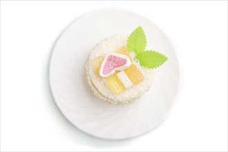 Decorated cake with milk and coconut cream isolated on white background. Side view, close up