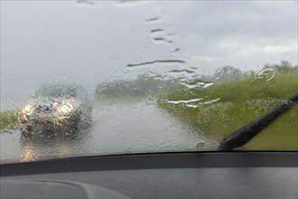 Heavy rain on the Old Post Road near Possendorf in the Eastern Ore Mountains, Possendorf, Saxony,