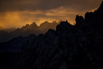 Montafon mountains with dramatic cloudy sky at sunrise, Tschagguns, Rätikon, Montafon, Vorarlberg,