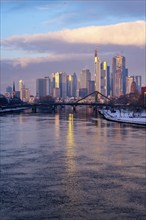 The skyline of Frankfurt am Main, skyscrapers of the banking district, Flößerbrücke, wintry